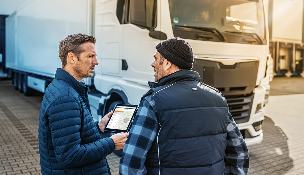 two men on truck station