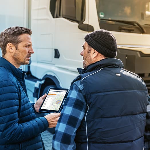 Two men at a loading dock