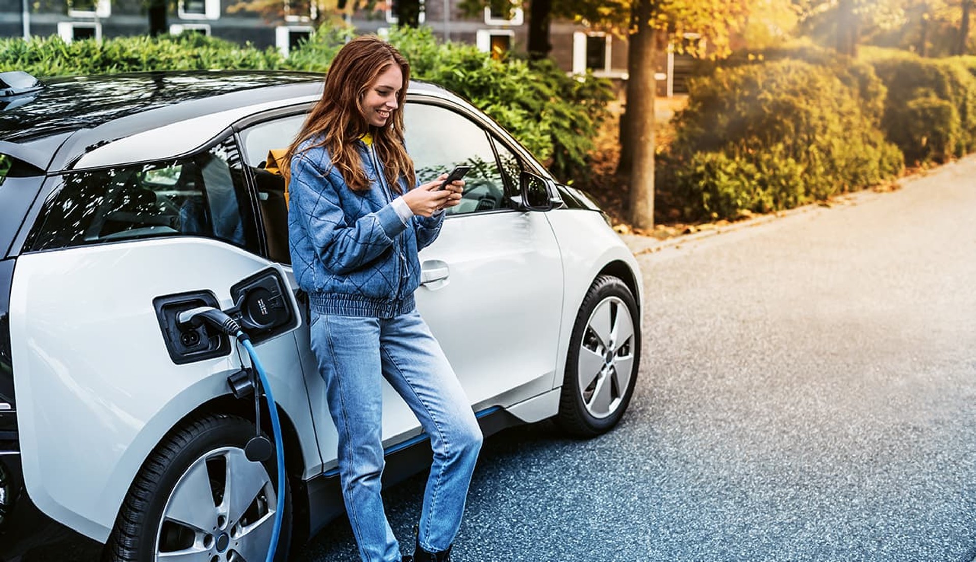 person leaning on an e-car