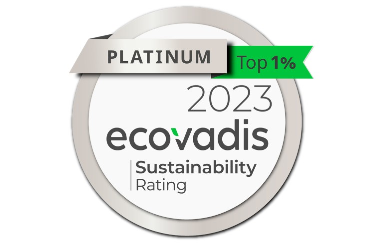 Employee points to screen with Ecovadis award on it
