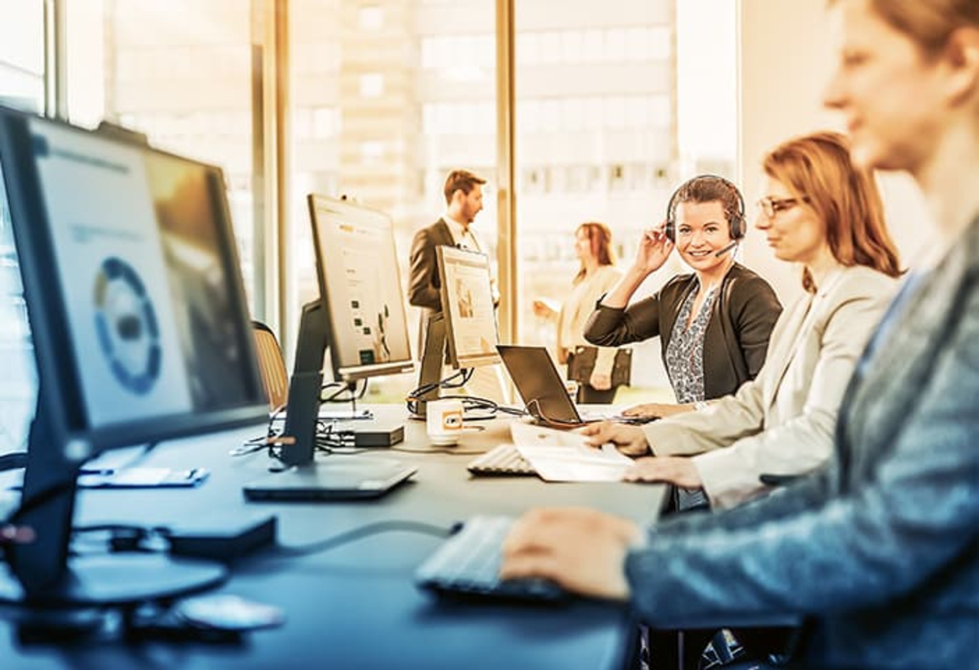 Employees working at their desks