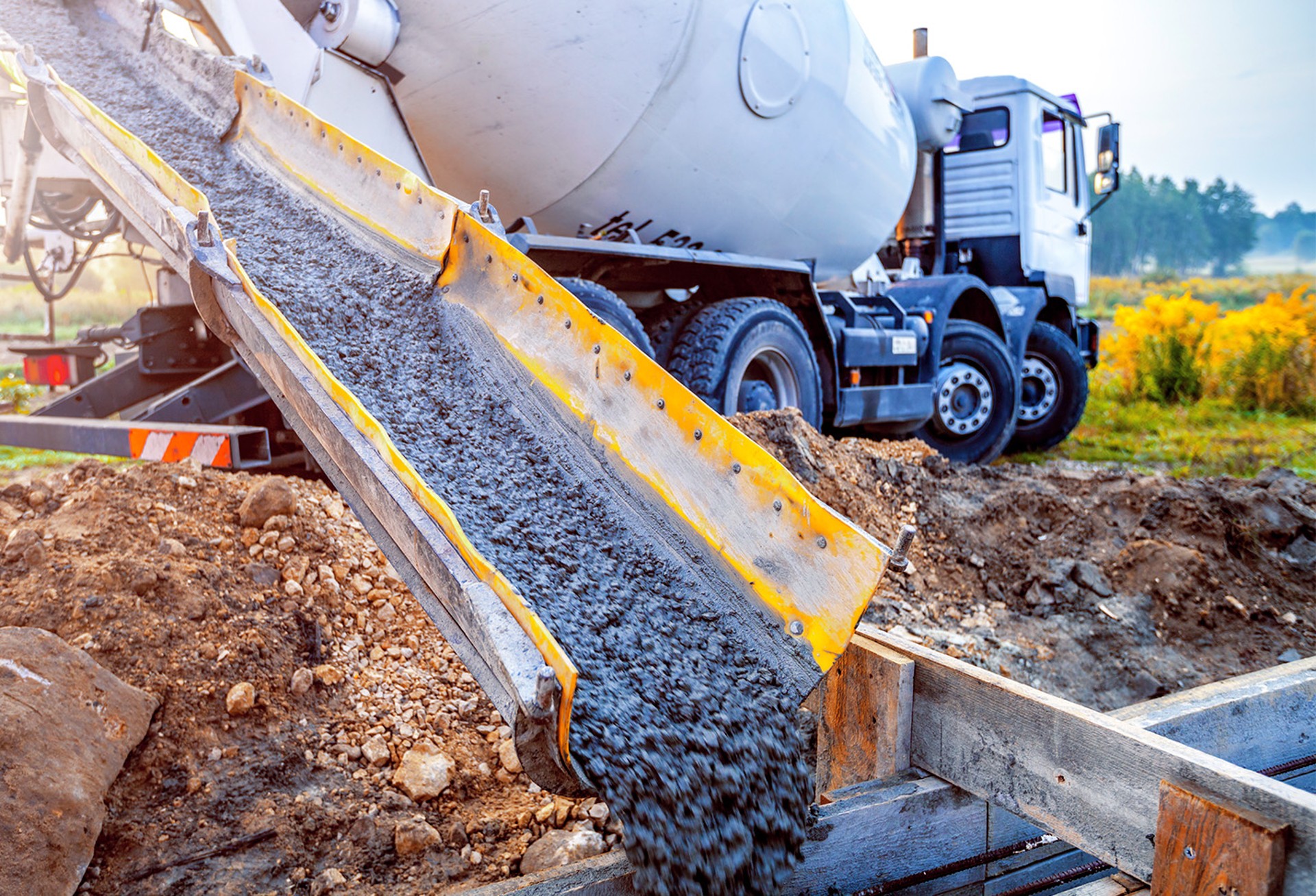 Concrete mixer pouring concrete