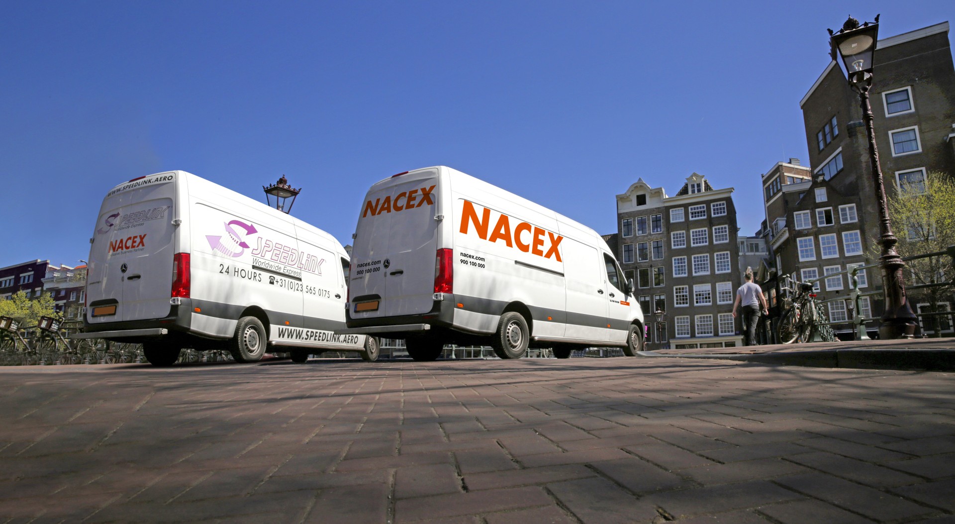 two parking nacex trucks