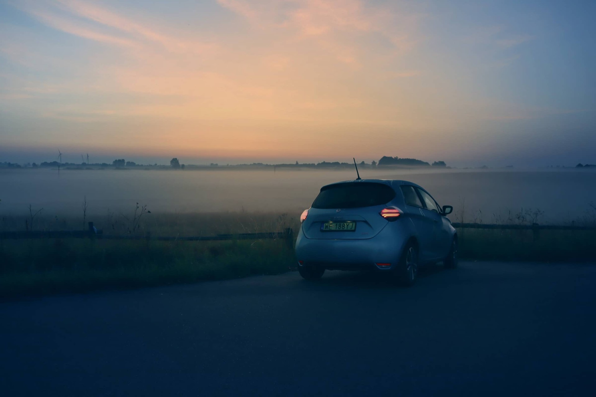 Electric car by sunrise