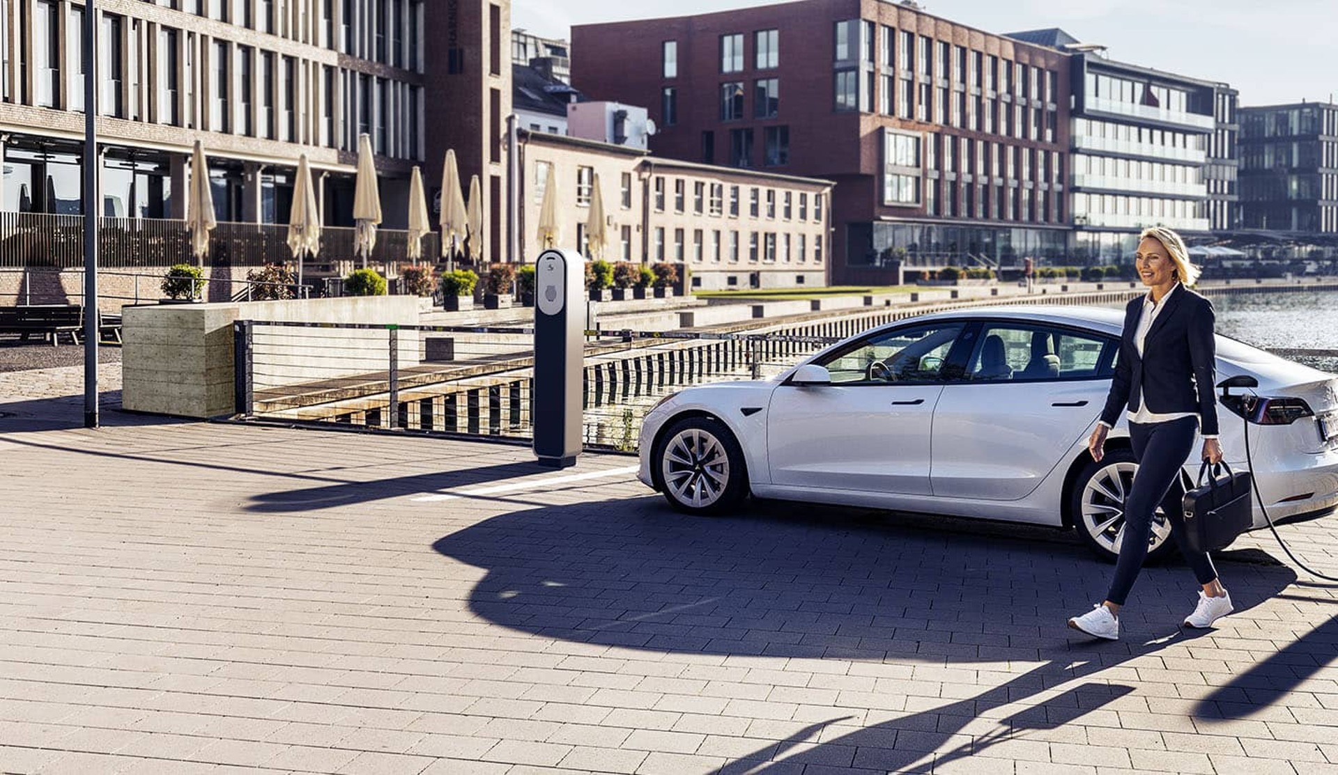 Woman in front of EV Woman in front of EV