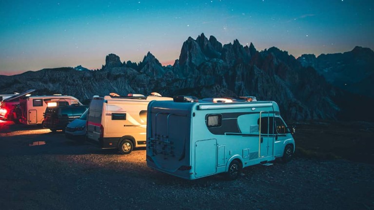 Campervan at the coast at sunset.