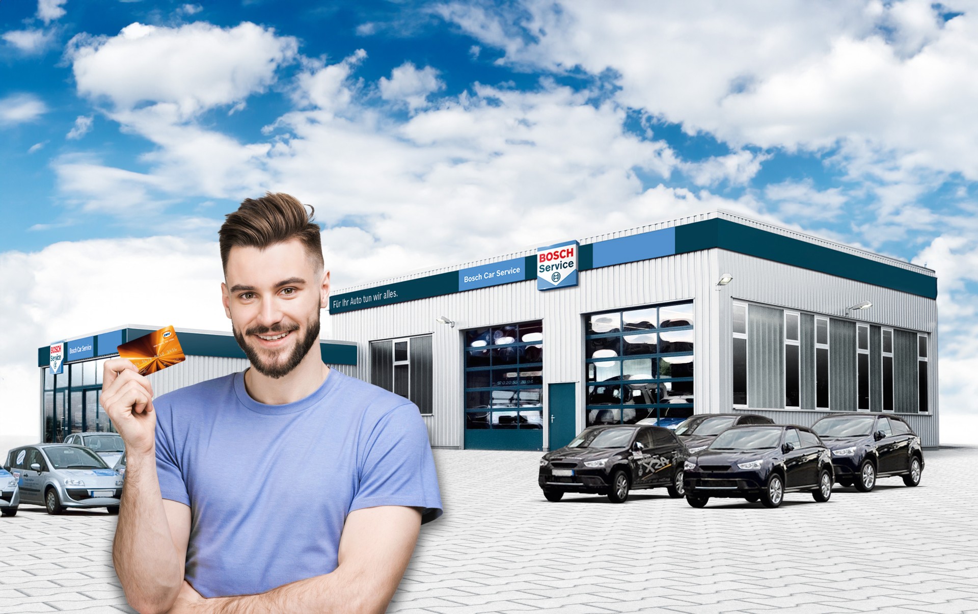 Mann mit DKV Card vor Bosch Car Service Station Mann mit DKV Card vor Bosch Car Service Station