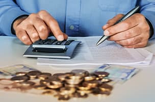 DKV tax refund person counting coins