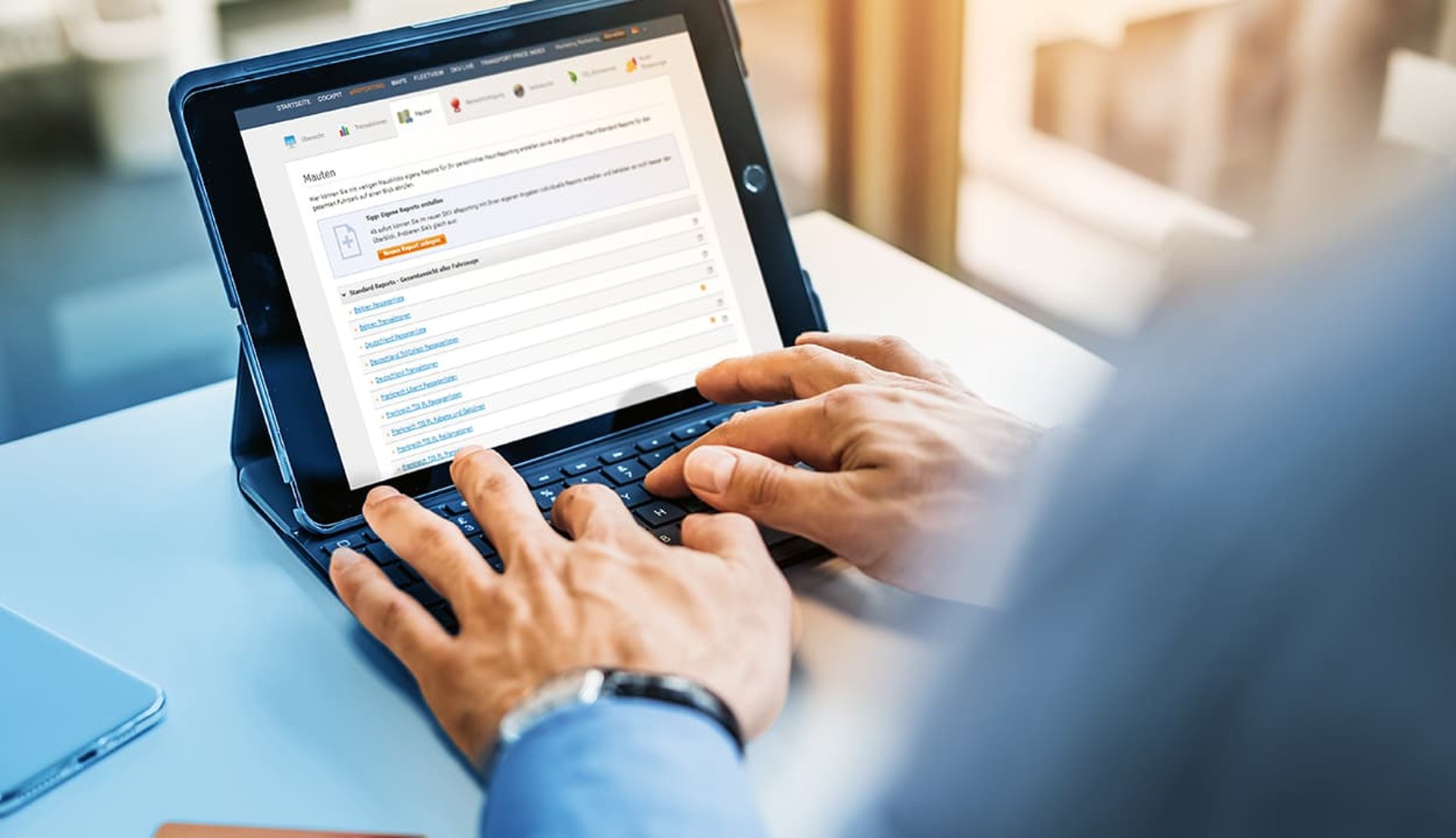 Man in front of a tablet Man in front of a tablet