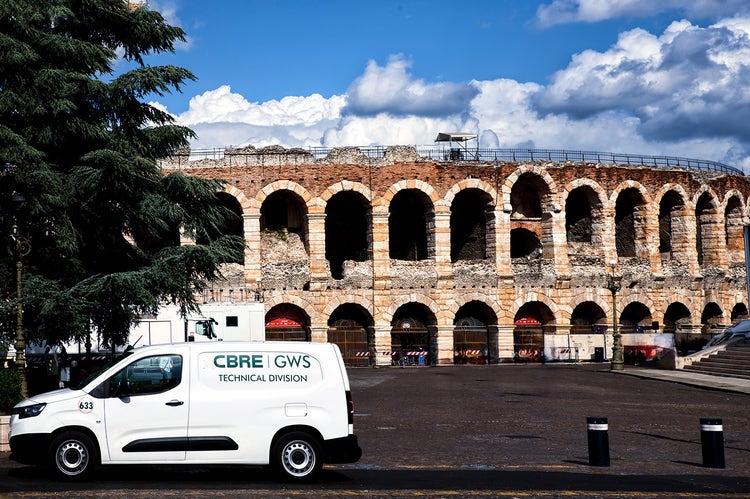 CBRE GWS car in front of the colooseum in Rome